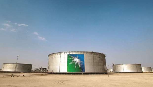 A view of branded oil tanks at Saudi Aramco oil facility in Abqaiq (file). The reductions had been anticipated in the market. Aramco had been expected to lower Arab Lightu2019s premium by 20 cents, according to a Bloomberg survey of seven traders and refiners.