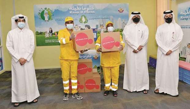 While celebrating the International Workers' Day, the Ministry of Municipality and Environment distributed food kits to the garden cleaners
