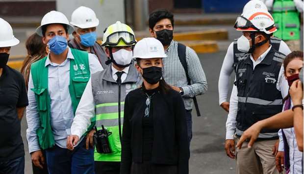 Mexico City's Mayor Claudia Sheinbaum visits the site a day after an overpass for a metro partially collapsed with train cars on it, at Olivos station, in Mexico City, Mexico