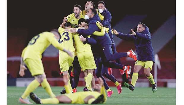 Villarreal players celebrate after the Europa League semi-final second leg against Arsenal in London on Thursday. (AFP)