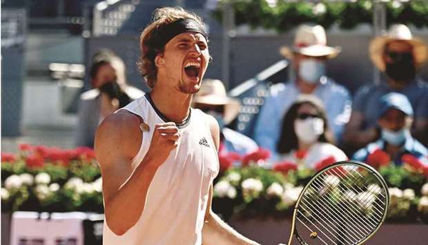 Germanyu2019s Alexander Zverev celebrates winning against Spainu2019s Rafael Nadal in the quarter-finals of the Madrid Open at the Caja Magica in Madrid yesterday.