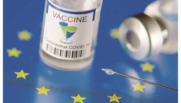 File photo shows vials labelled u201cSinopharm coronavirus disease (Covid-19) vaccineu201d placed on a displayed EU flag in this illustration picture.