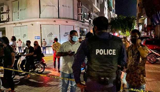 Police secure a site after a suspected bomb blast injured former Maldives president and current parliament speaker Mohamed Nasheed in Male on May 6. AFP