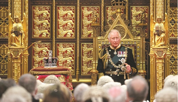 Prince Charles delivers the Queenu2019s Speech during the State Opening of Parliament in the House of Lords Chamber in the Houses of Parliament in London yesterday. (Reuters)