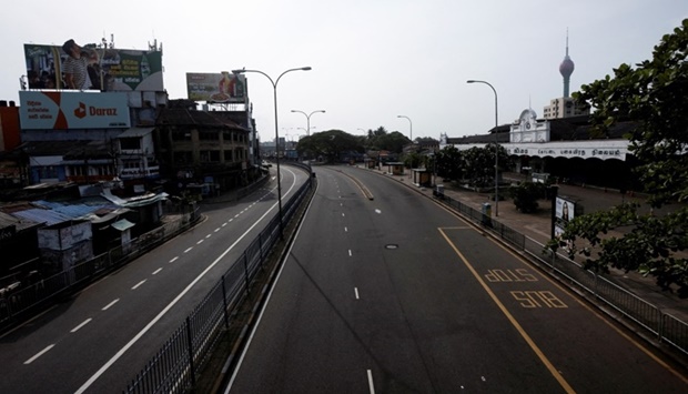 :A general view of a deserted road in the main business city after the curfew was extended for another day following a clash between anti-government demonstrators and supporters of Sri Lanka's ruling party, amid the country's economic crisis, in Colombo, Sri Lanka Wednesday. REUTERS