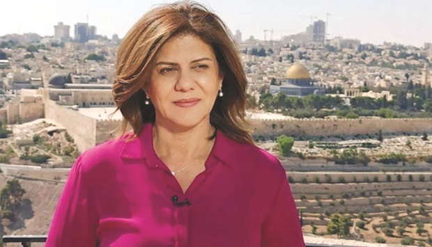 An undated handout photo released by the Doha-based Al-Jazeera TV shows the channelu2019s veteran journalist Shireen Abu Aqleh during one of her reports from Jerusalem. (AFP)