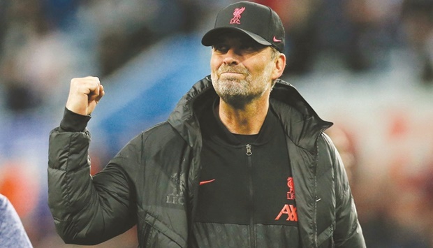 Liverpool manager Juergen Klopp celebrates after the Premier League match against Aston Villa in Birmingham on Tuesday. (Reuters)