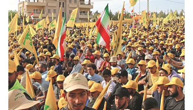 Supporters of the Hezbollah attend a campaign rally in Baalbek in Lebanonu2019s eastern Bekaa Valley yesterday, ahead of the upcoming parliamentary elections on May 15.