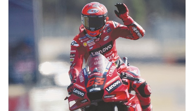 Ducati Lenovo Team Italian rider Francesco Bagnaia reacts after clinching the French Moto GP Grand Prix pole position at the Bugatti circuit in Le Mans, northwestern France, yesterday. (AFP)