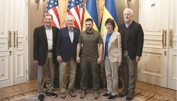 Ukraineu2019s President Volodymyr Zelenskiy poses for a picture with US Senate Minority Leader Mitch McConnell (R-KY), Senator Susan Collins (R-ME), Senator John Barrasso (R-WY) and Senator John Cornyn (R-TX) before a meeting in Kyiv yesterday. (Reuters)
