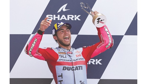 Gresini Racing MotoGPu2019s Enea Bastianini celebrates with the trophy after winning the French GP at the Circuit Bugatti in Le Mans, France, yesterday. (Reuters)