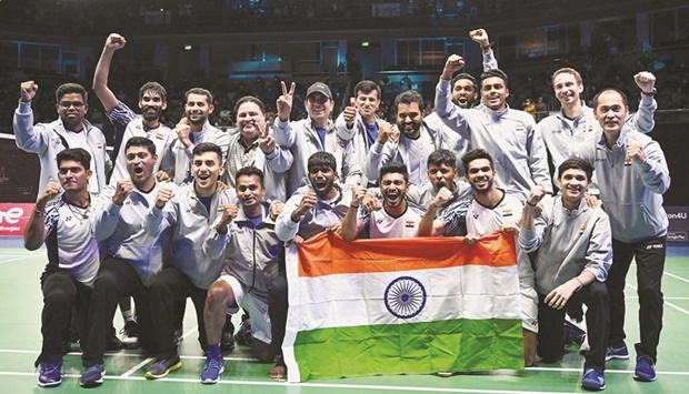 Members of the Indian menu2019s badminton team celebrate after defeating Indonesia in the finals of the Thomas Cup in Bangkok on Sunday. (AFP)