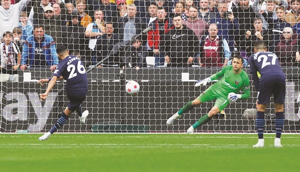 West Hamu2019s goalkeeper Lukasz Fabianski saves a penalty from Manchester Cityu2019s Riyad Mahrez (left) during the Premier League in London yesterday. (Reuters)