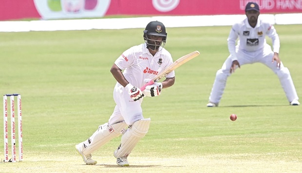 Bangladeshu2019s Tamim Iqbal plays a shot during the third day of the first Test against Sri Lanka at the Zahur Ahmed Chowdhury Stadium in Chittagong yesterday. (AFP)