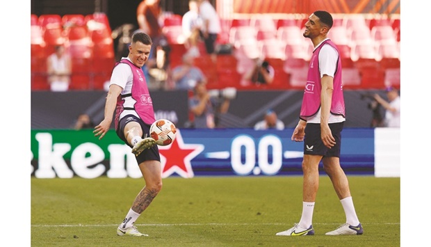 Rangersu2019 Aaron Ramsey (left) and Leon Balogun during a training session at the Ramon Sanchez Pizjuan Stadium in Seville, Spain, yesterday. (Reuters)