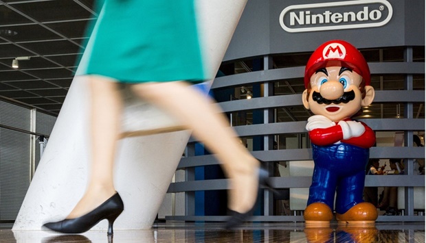 A figure of u201cMariou201d, a character in Nintendou2019s u201cMario Brosu201d video games, at a Nintendo centre in Tokyo (file). Saudi Arabiau2019s Public Investment Fund took a 5.01% stake in Nintendo Co, its third investment in a Japanese games company as the industry consolidates.
