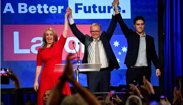 Anthony Albanese, leader of Australia's Labor Party is accompanied by his partner Jodie Haydon and son Nathan Albanese to address his supporters after incumbent Prime Minister and Liberal Party leader Scott Morrison conceded defeat in the country's general election, in Sydney, Australia. REUTERS