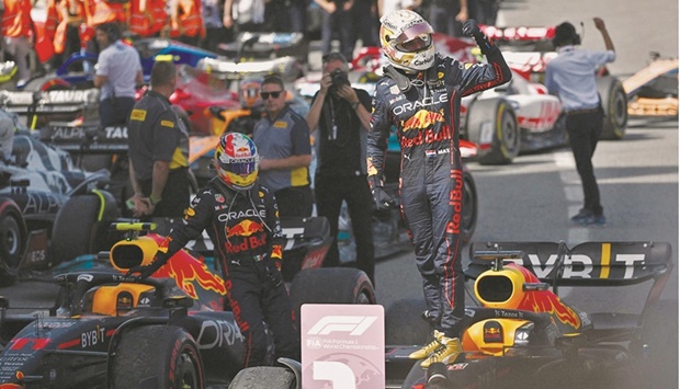 Red Bullu2019s Dutch driver Max Verstappen celebrates on top of his car at the parc ferme after winning the Spanish Grand Prix at the Circuit de Catalunya in Montmelo, on the outskirts of Barcelona, yesterday. (AFP)