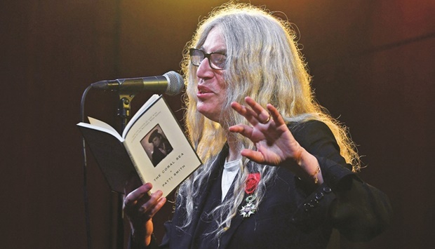 US singer-songwriter Patti Smith reads from her book The Coral Sea after receiving the Legion du2019Honneur at Brooklyn Public Library in New York. (AFP)