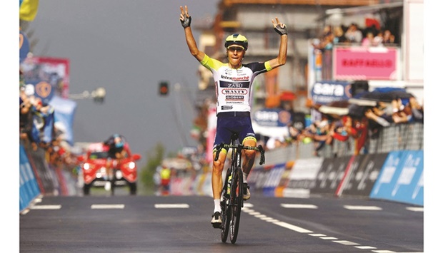 Team Wantyu2019s Czech rider Jan Hirt celebrates as he crosses the finish line to win the 16th stage of the Giro du2019Italia 2022, a distance of 177 kilometres from Salo to Aprica yesterday. (AFP)