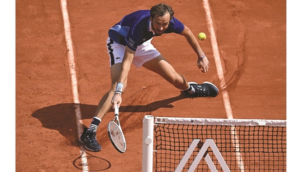 Russiau2019s Daniil Medvedev in action during his French Open first round match against Argentinau2019s Facundo Bagnis at the Roland Garros in Paris yesterday. (Reuters)