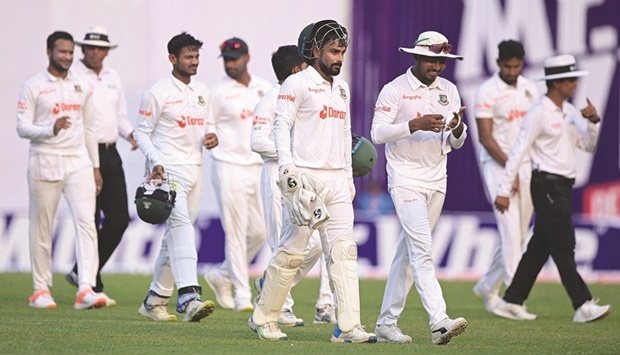 Bangladesh players walk off the field at the end of the second day of the second Test against Sri Lanka at the Sher-e-Bangla National Cricket Stadium in Dhaka yesterday. (AFP)
