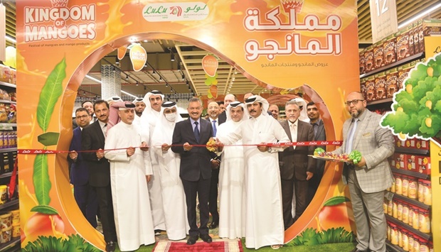 Indian ambassador Dr Deepak Mittal inaugurates the 'Kingdom of Mangoes' festival yesterday at LuLu Hypermarket's Ain Khalid branch in the presence of other dignitaries. PICTURE: Shaji Kayamkulam.