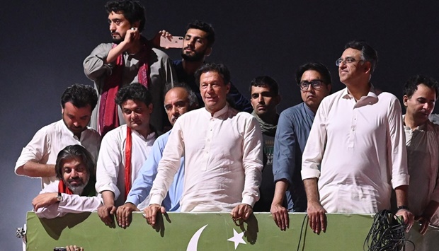 Ousted Pakistan's prime minister Imran Khan (C) leads a rally in Islamabad early on May 26, 2022.