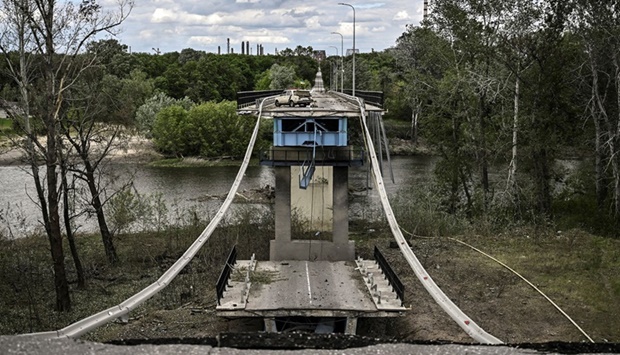 The destroyed bridge connecting the city of Lysychansk with the city of Sievierodonetsk in the eastern Ukranian region of Donbas. (AFP)