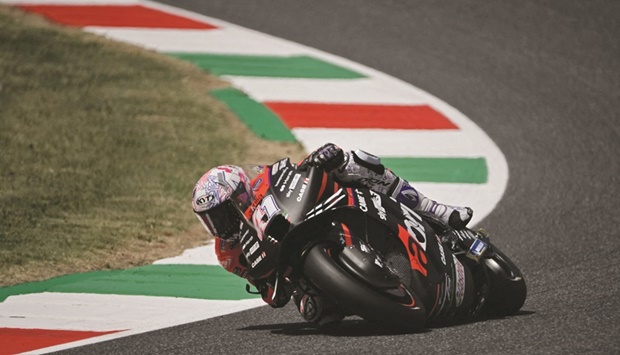 Aprilia Racingu2019s Spanish MotoGP rider Aleix Espargaro takes a bend during the second free practice session at the Mugello race track, Tuscany, yesterday. (AFP)