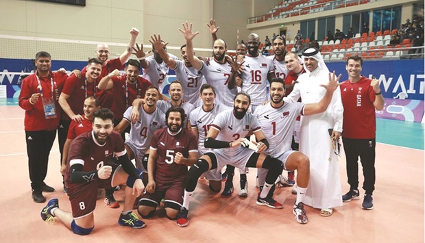 Qataru2019s volleyball players celebrate after winning the gold medal at the GCC Games in Kuwait yesterday.