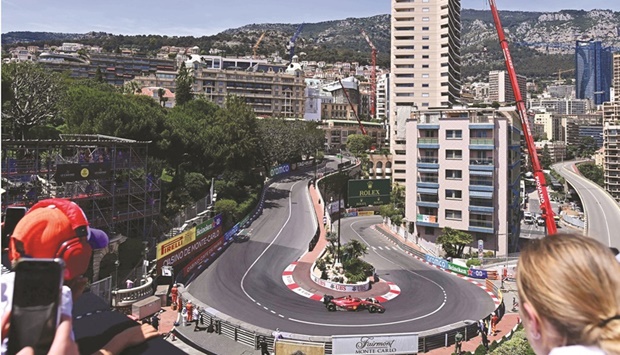 Ferrariu2019s Monegasque driver Charles Leclerc is seen driving his F1 car during the first practice session at the Monaco street circuit in Monaco yesterday. (AFP)