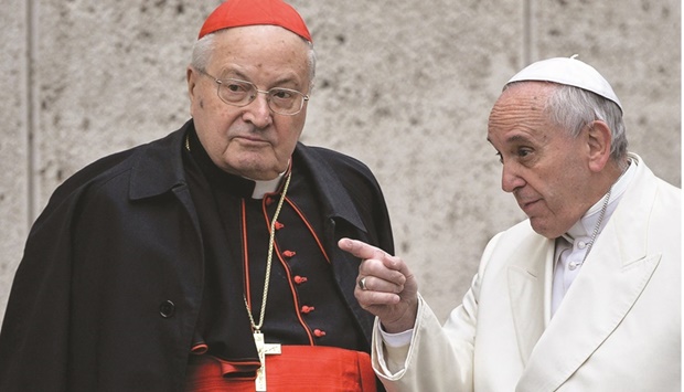 In this file photo taken on February 13, 2015, Pope Francis (right) speaks with Italian Cardinal Angelo Sodano as he arrives to take part with carIn this file photo taken on February 13, 2015, Pope Francis (right) speaks with Italian Cardinal Angelo Sodano as he arrives to take part with cardinals and bishops in the Papal consistory before the nominations of new cardinals at the Vatican. (AFP)dinals and bishops in the Papal consistory before the nominations of new cardinals at the Vatican. (AFP)