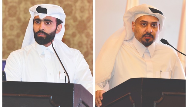 QDB acting chief executive Abdulrahman Hesham al-Sowaidi, left, and QFC Authority chief executive Yousuf Mohamed al-Jaida.