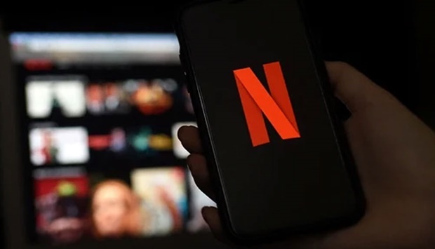(Representative photo) In this file photo, a mobile phone screens display the Netflix logo. (AFP)