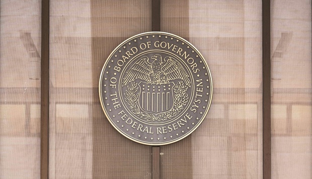 The seal of the Federal Reserve Board of Governors is displayed across from the Marriner S Eccles Federal Reserve building in Washington, DC. The US central banku2019s policy-making Federal Open Market Committee on Wednesday voted unanimously to increase the benchmark rate by a half percentage point.