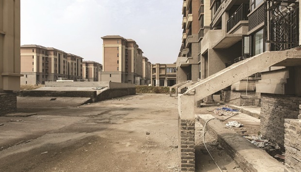 Unfinished apartment buildings at the construction site of China Evergrande Groupu2019s Health Valley development on the outskirts of Nanjing. Mergers and acquisitions by listed Chinese developers in the first quarter slumped to the lowest since the pandemic began, data compiled by Bloomberg show.