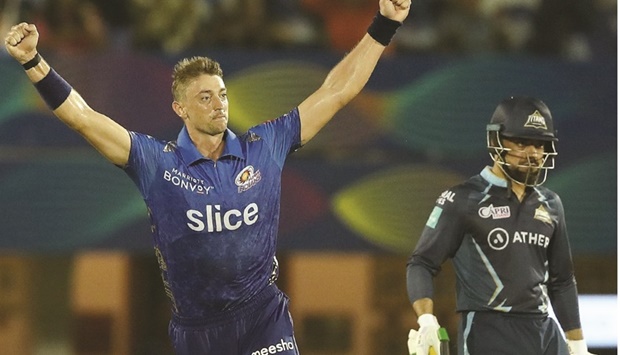Mumbai Indians pacer Daniel Sams celebrates during his teamu2019s IPL clash against Gujarat Titans in Mumbai yesterday.