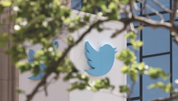 The Twitter logo is seen at its headquarters in downtown San Francisco, California. Musk has promised to revitalise the company and expand the number of users by cracking down on spam bots and reducing the amount of moderation to facilitate more u201cfree speechu201d.