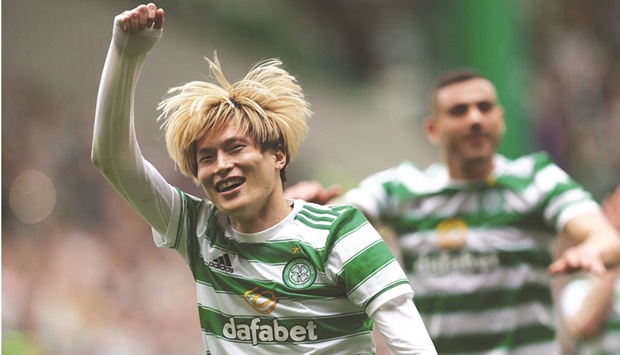 Celticu2019s Kyogo Furuhashi celebrates after their win over Heart in the Scottish Premiership match in Glasgow yesterday. (Reuters)