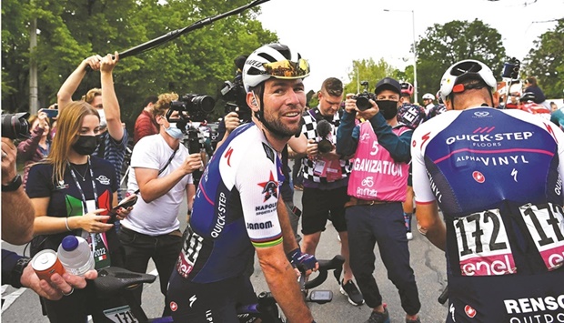 Team Quick-Step Alpha Vinylu2019s British rider Mark Cavendish reacts after he crossed the finish line to win the third stage of the Giro du2019Italia 2022 cycling race, 201 kilometres between Kaposvar and Balatonfured, Hungary, yesterday. (AFP)
