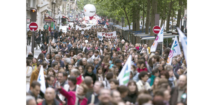 People demonstrate against proposed reforms of secondary education yesterday in Paris.