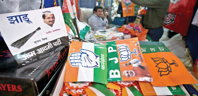 Flags and election campaign materials of various national and regional parties are seen for sale at a wholesale shop in New Delhi yesterday.