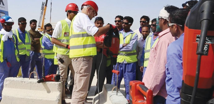  Workers get a briefing as part of the Supreme Committee for Delivery and Legacyu2019s Al Wakrah Annual Safety Day.