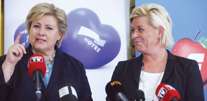 Solberg with Progress Party leader Siv Jensen.