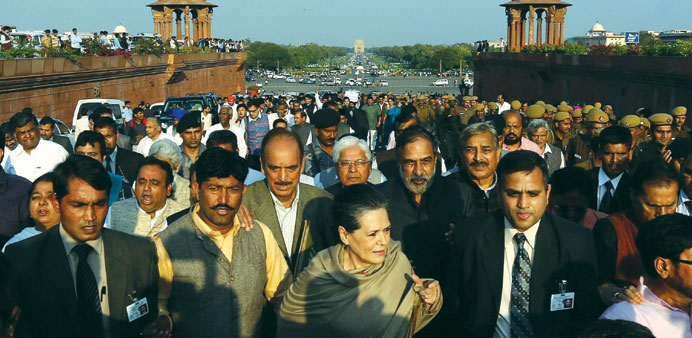 Congress Party president Sonia Gandhi marches along with the members of other opposition parties to the Rashtrapati Bhavan in New Delhi yesterday.