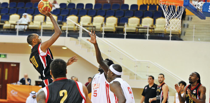 Action during the match between Al Rayyan and Al Arabi in the Emir Cup basketball tournament.