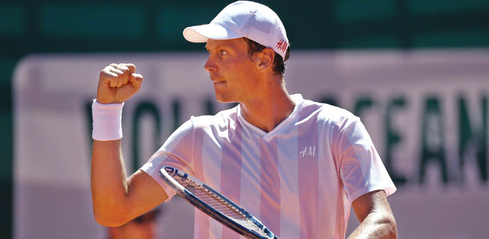 Tomas Berdych celebrates after winning the Portugal Open semi-final against Victor Hanescu at Jamor stadium in Oeiras, Lisbon, yesterday.