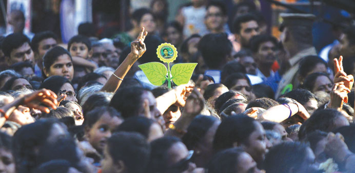 Supporters of All India Anna Dravida Munetra Khazhgam (AIADMK) attend an election campaign rally addressed by Tamil Nadu Chief Minister and party chie