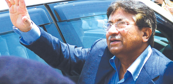 Former Pakistanu2019s president Pervez Musharraf waves after appearing at the Sindh hight court in Karachi yesterday.